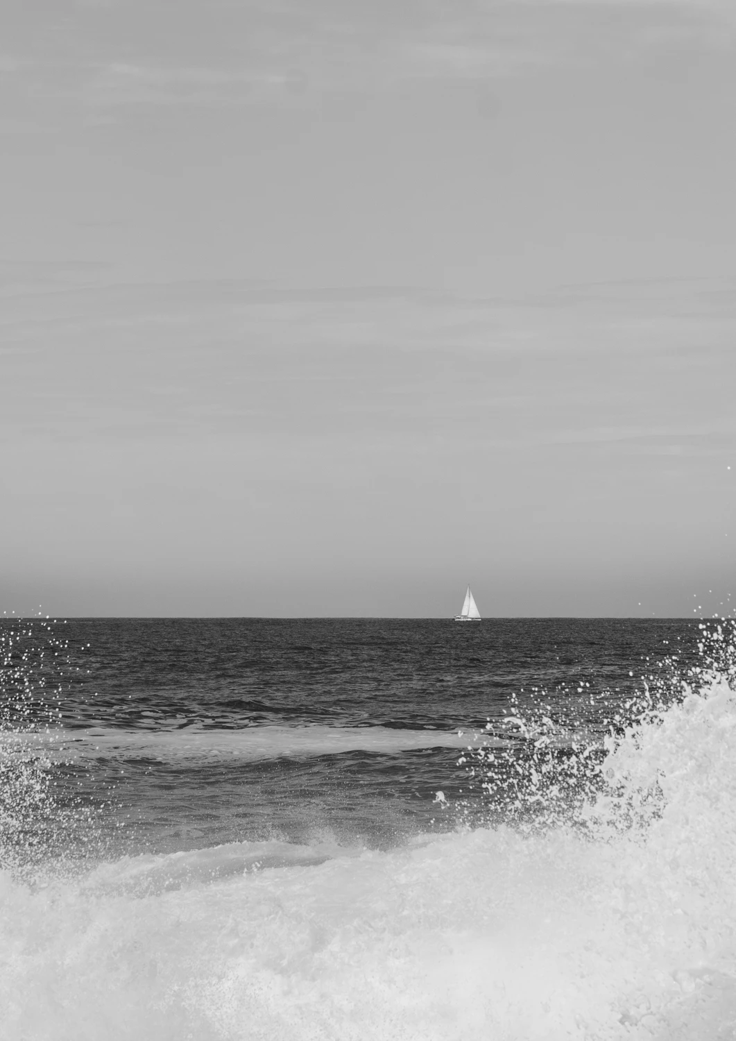 sailing boat and waves