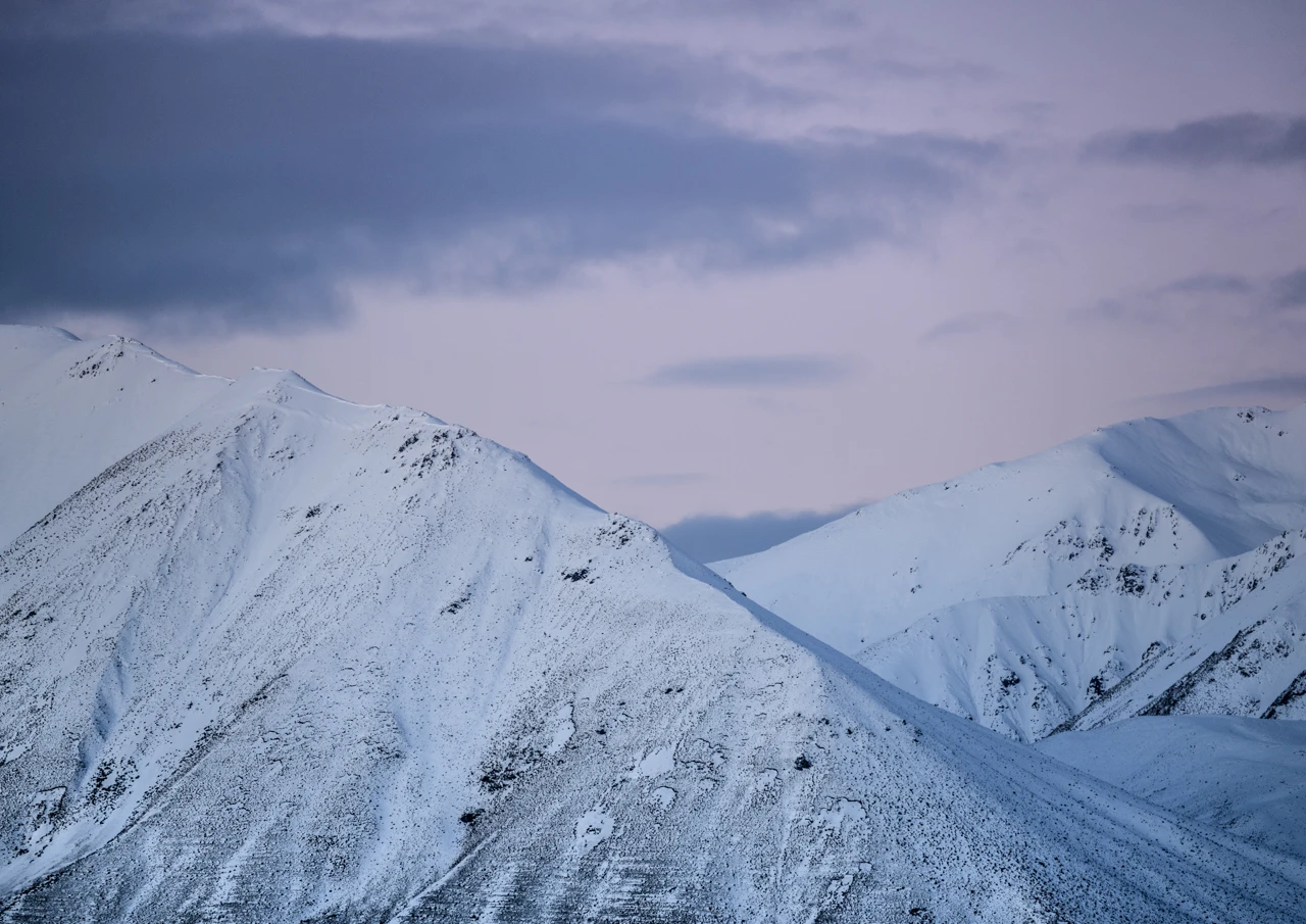 Snowy mountains near Lake heron New Zealand