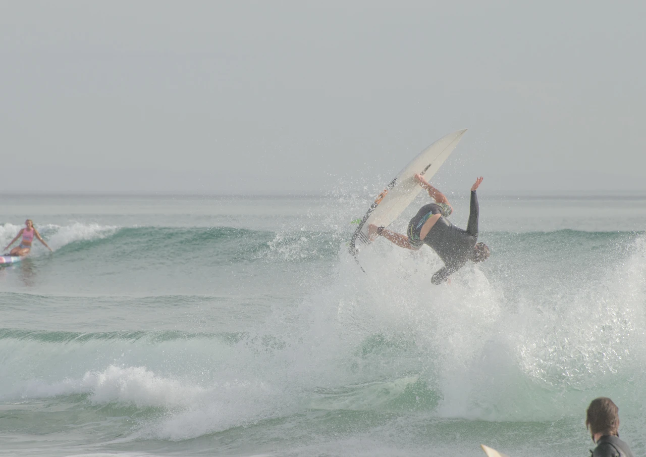 Surfer jumping