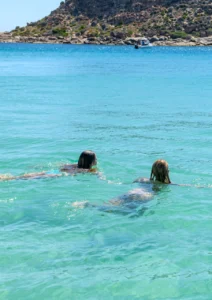 Two girls swimming