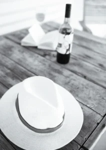 sun hat and wine